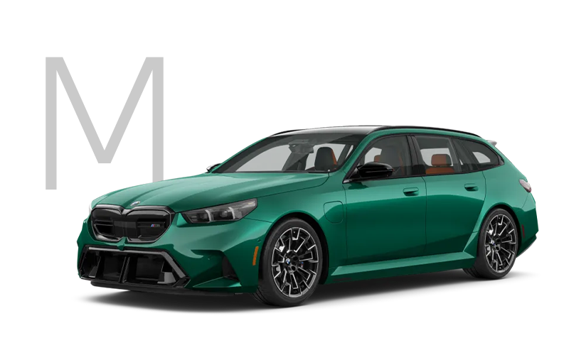The new BMW M5 Touring in green with M logo. | BMW of Grand Blanc in Grand Blanc MI
