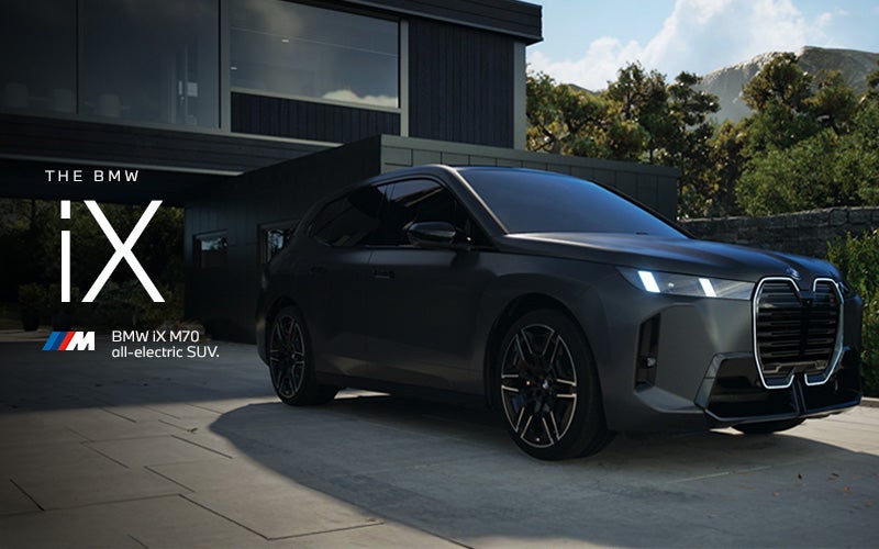 The BMW iX M70 parked. Click to learn more. | BMW of Grand Blanc in Grand Blanc MI