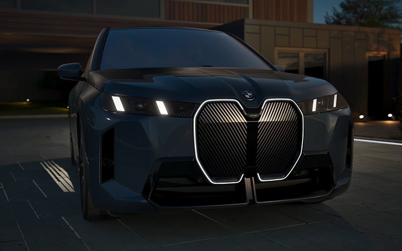 The BMW iX illuminated kidney grille. | BMW of Grand Blanc in Grand Blanc MI