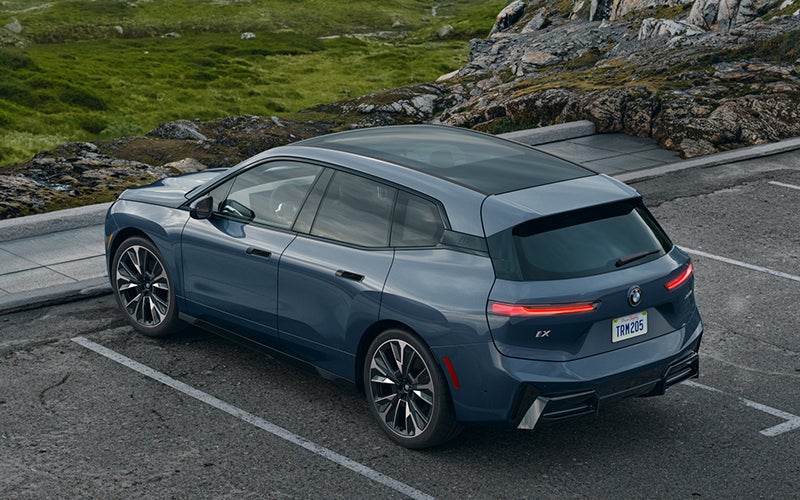 The BMW iX parked in a parking spot. | BMW of Grand Blanc in Grand Blanc MI