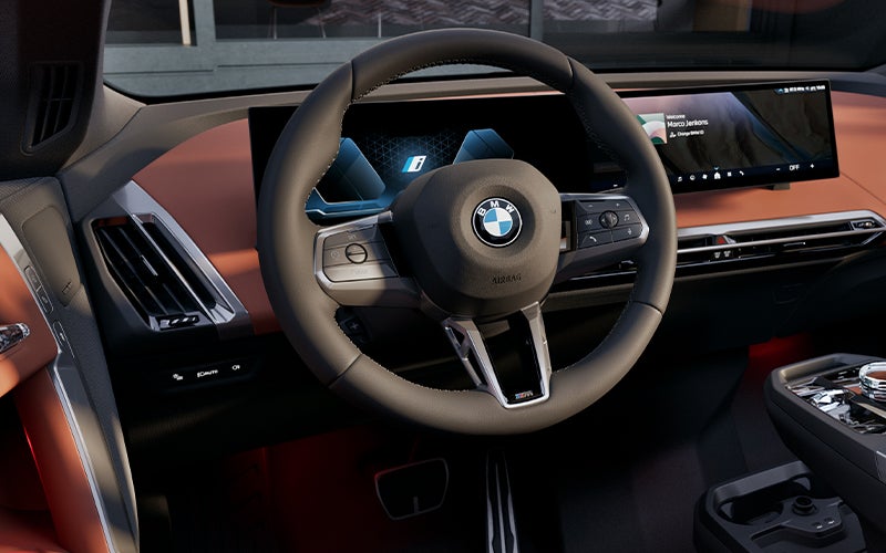 The BMW iX steering wheel. | BMW of Grand Blanc in Grand Blanc MI