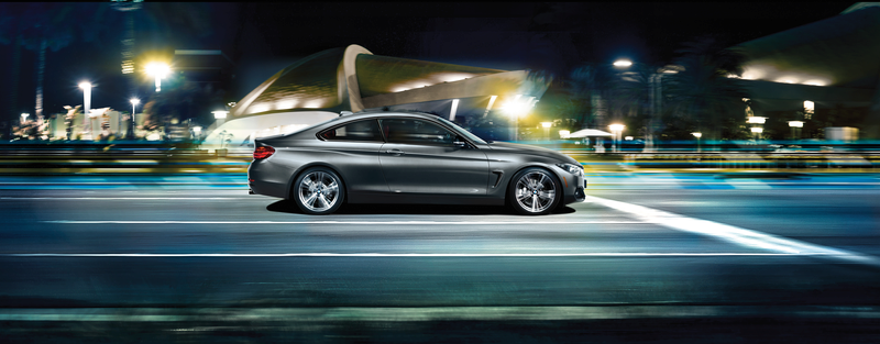 BMW driving on the road